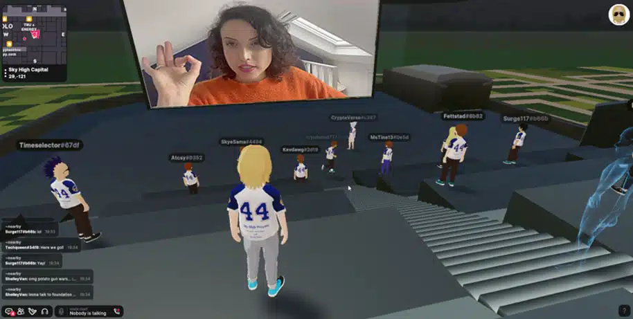 Decentraland audience avatars watching Victoria Olsina perform on a virtual screen